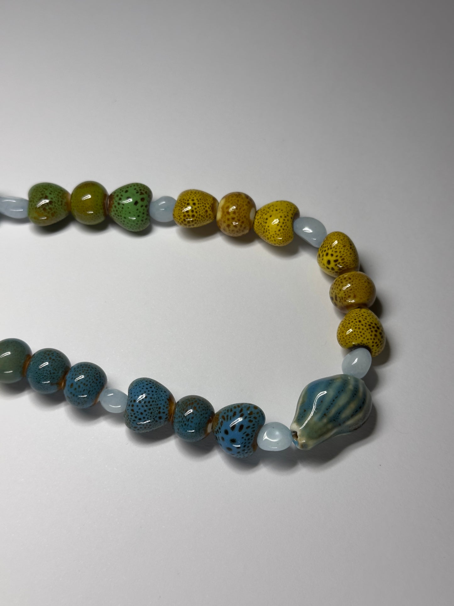1 OF 1  CERAMIC SHELL NECKLACE