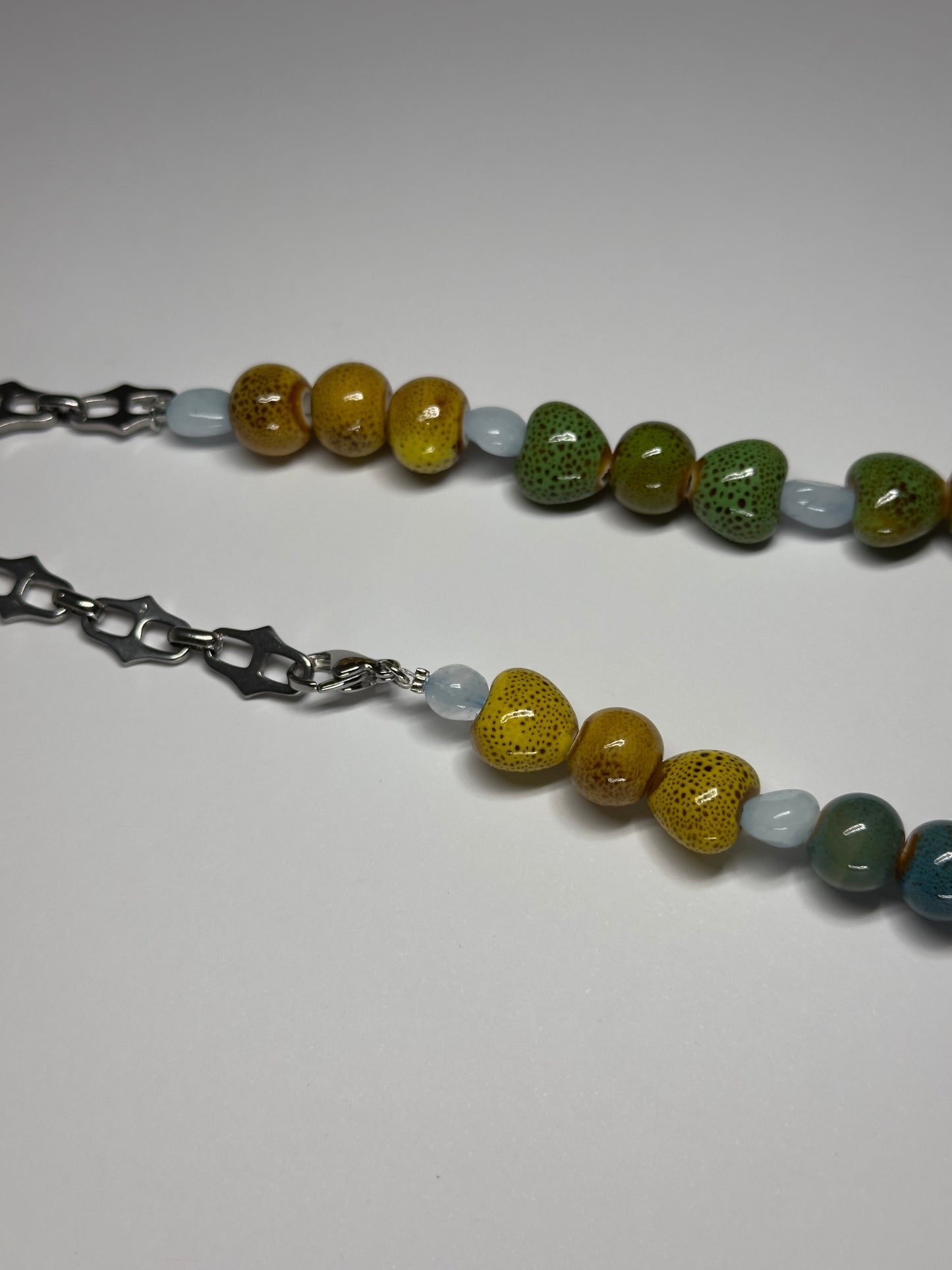 1 OF 1  CERAMIC SHELL NECKLACE